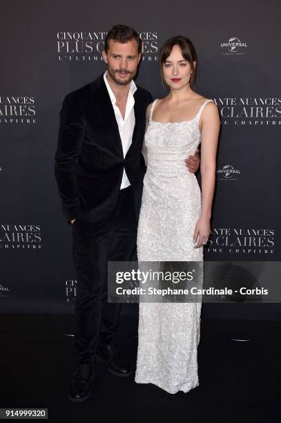 Jamie Dornan and Dakota Johnson attend the "Fifty Shades Freed - 50 Nuances Plus Clair" Paris Premiere at Salle Pleyel on February 6, 2018 in Paris,...