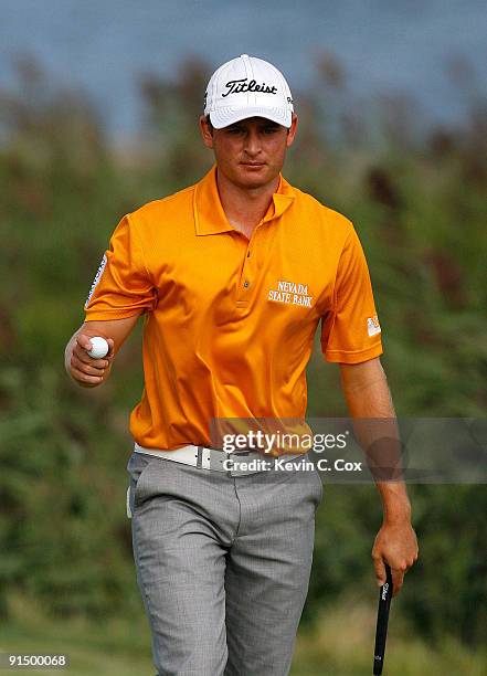 John Merrick waves his ball during round one at The Barclays on August 27, 2009 at Liberty National in Jersey City, New Jersey.