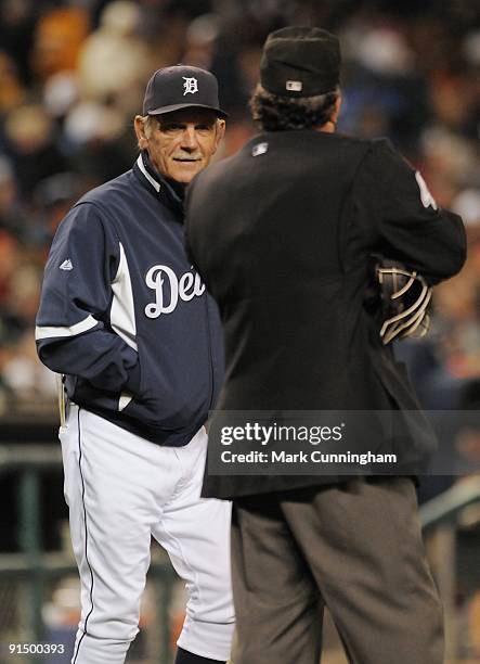 Jim Leyland of the Detroit Tigers talks with Major League umpire Tim Tschida during the game against the Chicago White Sox at Comerica Park on...