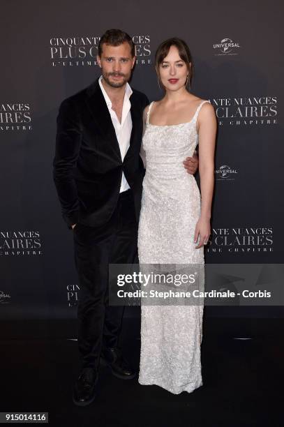 Jamie Dornan and Dakota Johnson attend the "Fifty Shades Freed - 50 Nuances Plus Clair" Paris Premiere at Salle Pleyel on February 6, 2018 in Paris,...