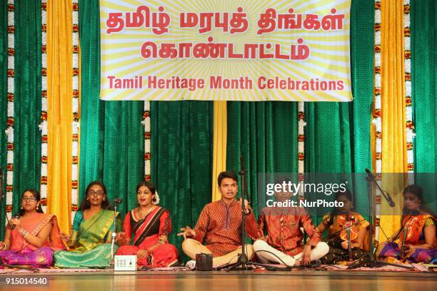 Tamil youth perform songs in the traditional Carnatic style of music during a cultural program celebrating Tamil Heritage Month in Stouffville,...