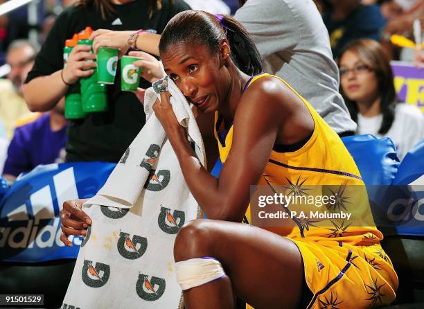 Lisa Leslie of the Los Angeles Sparks takes a break from the action in Game Two of the Western Conference Finals against the Phoenix Mercury during...