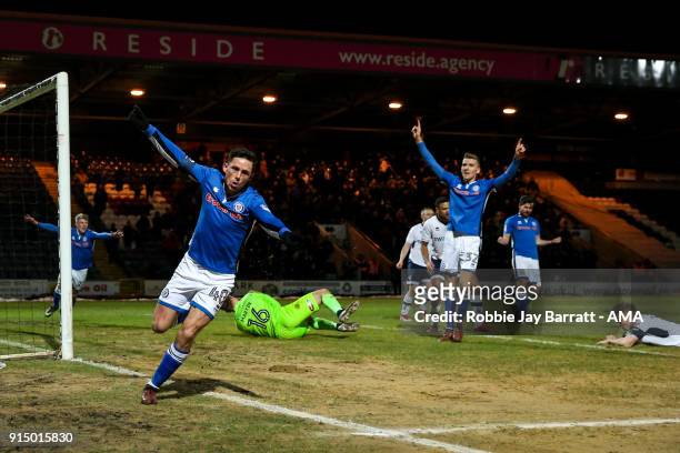 Ian Henderson of Rochdale celebrates after scoring a goal to make it 1-0 during The Emirates FA Cup Fourth Round Replay at Spotland Stadium on...