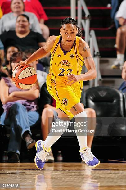 Betty Lennox of the Los Angeles Sparks drives the ball up court in Game Three of the Western Conference Finals against the Phoenix Mercury during the...