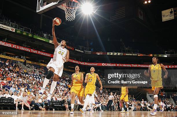 Le'coe Willingham of the Phoenix Mercury lays up a shot against Betty Lennox of the Los Angeles Sparks in Game Three of the Western Conference Finals...