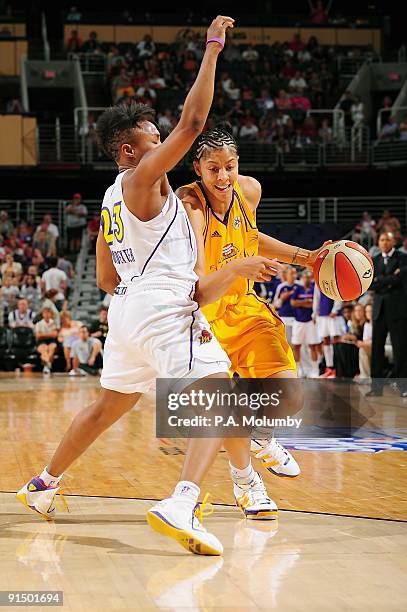 Candace Parker of the Los Angeles Sparks drives the ball against Cappie Pondexter of the Phoenix Mercury in Game Two of the Western Conference Finals...