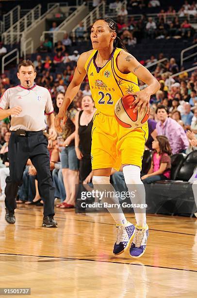 Betty Lennox of the Los Angeles Sparks moves the ball to the basket in Game Three of the Western Conference Finals against the Phoenix Mercury during...