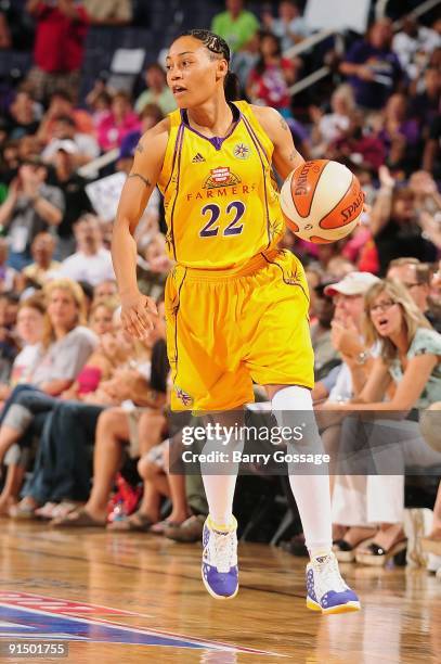 Betty Lennox of the Los Angeles Sparks drives the ball up court in Game Three of the Western Conference Finals against the Phoenix Mercury during the...