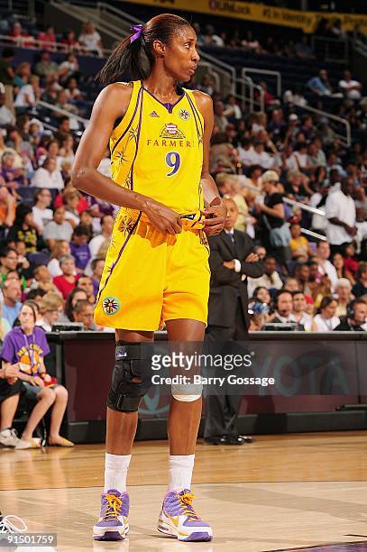 Lisa Leslie of the Los Angeles Sparks takes a break from the action in Game Three of the Western Conference Finals against the Phoenix Mercury during...