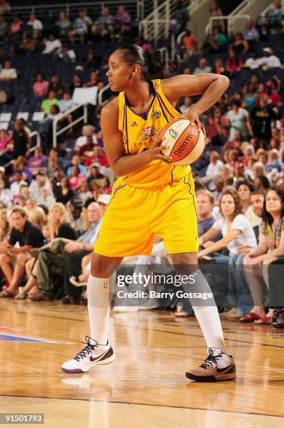 Noelle Quinn of the Los Angeles Sparks moves the ball to the basket in Game Three of the Western Conference Finals against the Phoenix Mercury during...