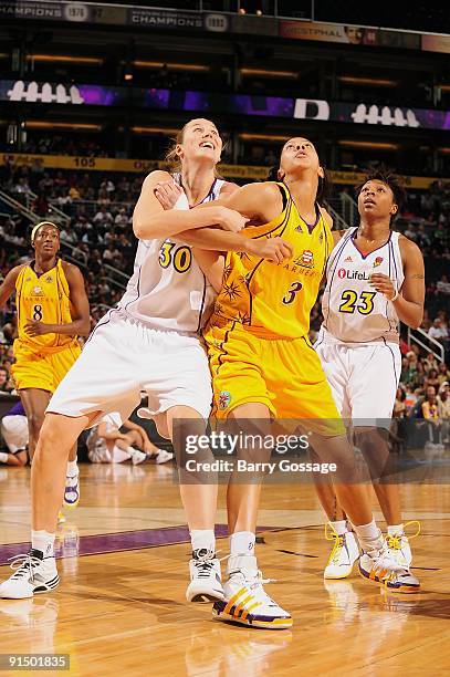 Nicole Ohlde of the Phoenix Mercury boxes out Candace Parker of the Los Angeles Sparks in Game Two of the Western Conference Finals during the 2009...