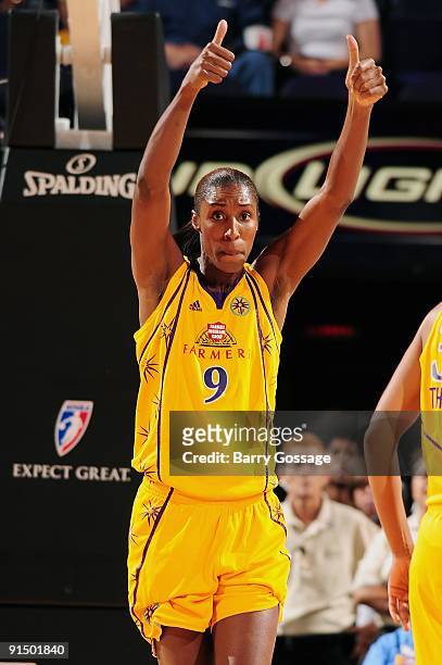 Lisa Leslie of the Los Angeles Sparks gives the thumbs up in Game Two of the Western Conference Finals against the Phoenix Mercury during the 2009...