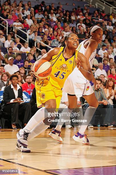 Noelle Quinn of the Los Angeles Sparks drives the ball to the basket in Game Two of the Western Conference Finals against the Phoenix Mercury during...