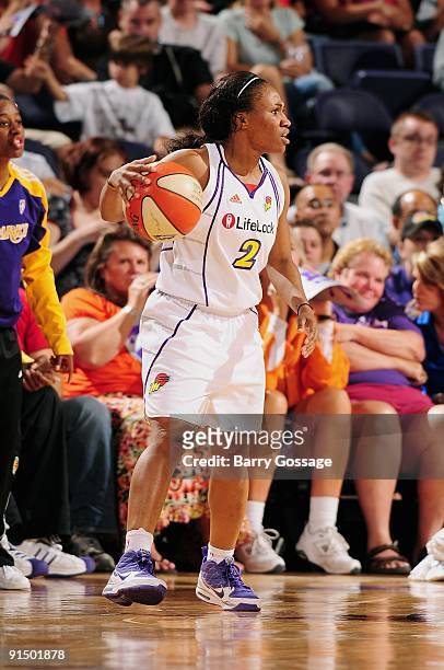 Temeka Johnson of the Phoenix Mercury moves the ball to the basket in Game Two of the Western Conference Finals against the Los Angeles Sparks during...