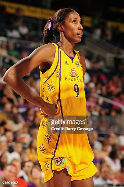 Lisa Leslie of the Los Angeles Sparks takes a break from the action in Game Two of the Western Conference Finals against the Phoenix Mercury during...