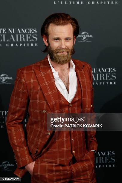 Actor Eric Johnson poses as he arrives to attend 'Fifty Shades Freed - 50 Nuances Plus Claires' Premiere at Salle Pleyel in Paris on February 6, 2018.