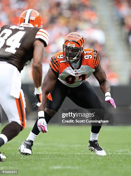 Robert Geathers of the Cincinnati Bengals defends against Robert Royal of the Cleveland Browns at Cleveland Browns Stadium on October 4, 2009 in...