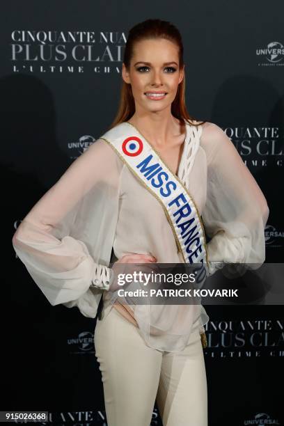 Miss France Maëva Coucke poses as she arrives to attend 'Fifty Shades Freed - 50 Nuances Plus Claires' Premiere at Salle Pleyel in Paris on February...