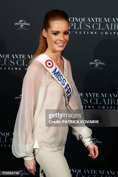 Miss France Maëva Coucke poses as she arrives to attend 'Fifty Shades Freed - 50 Nuances Plus Claires' Premiere at Salle Pleyel in Paris on February...