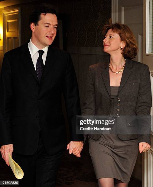 In this handout image supplied by the Conservative Party,Shadow Chancellor George Osborne with his wife Frances Osborne at the conference hotel in...