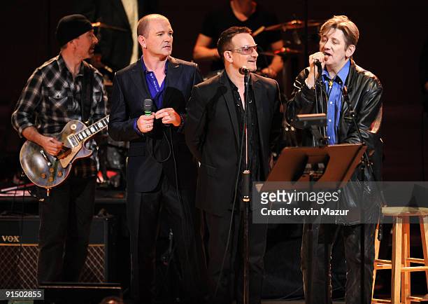 The Edge, Gavin Friday, Bono and Shane MacGowan perform at Carnegie Hall during the NIGHTS Concert celebrating the music of Gavin Friday on October...