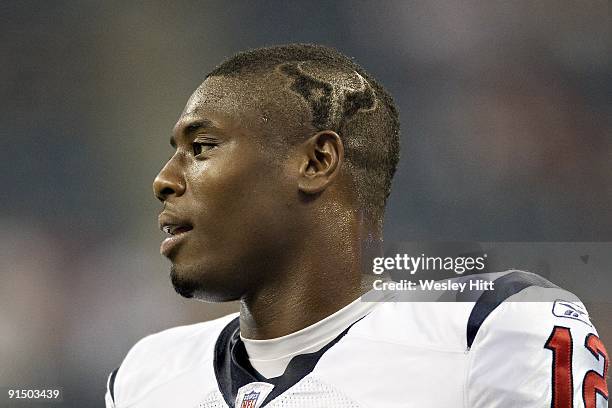 Jacoby Jones of the Houston Texans shows off the Texan logo shaved into his head before a game against the Oakland Raiders at Reliant Stadium on...