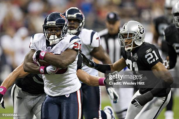 Steve Slaton of the Houston Texans runs with the ball against the Oakland Raiders at Reliant Stadium on October 4, 2009 in Houston, Texas. The Texans...