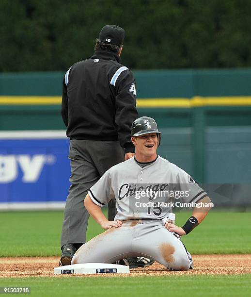 Gordon Beckham of the Chicago White Sox looks up in disbelief after Major League umpire Tim Tschida called him out at second base on a throw from...