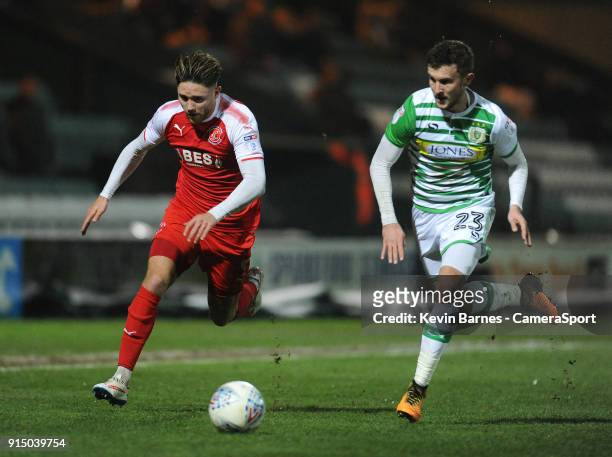 Fleetwood Town's Wes Burns under pressure from Yeovil Town's Tom James during the Checkatrade Trophy Quarter-Final match between Yeovil Town and...