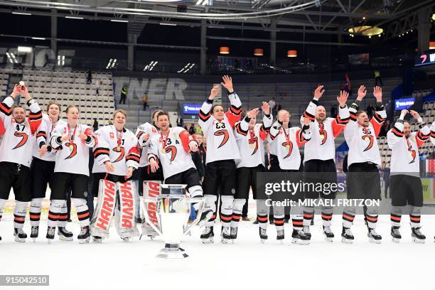 Jyvaskyla's players celebrate after winning the Champions Hockey League final match between Vaxjo Lakers and JYP Jyvaskyla at the Vida Arena in...