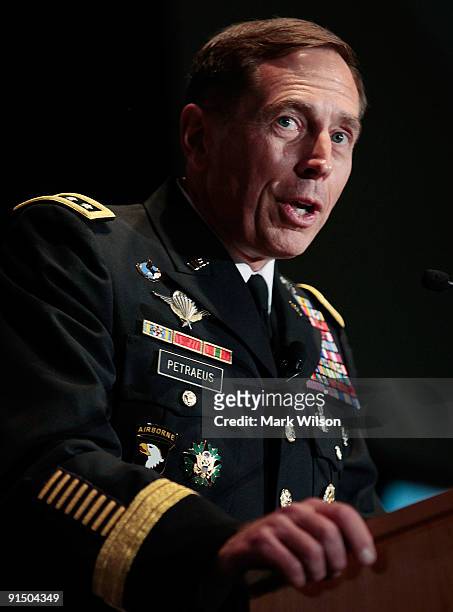 Army Gen. David Petraeus speaks during the Convention and Exposition of the Association of the United States Army at the Convention Center October 6,...