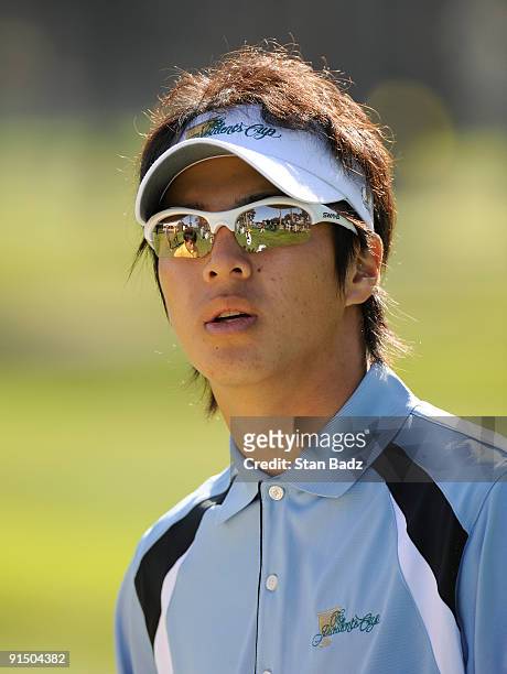 Ryo Ishikawa watches play during practice for The Presidents Cup at Harding Park Golf Club on October 6, 2009 in San Francisco, California.