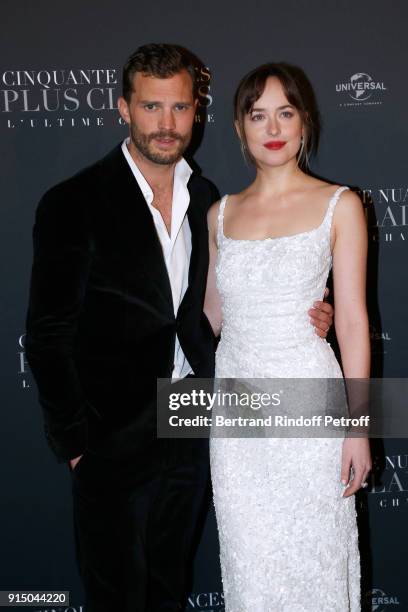 Jamie Dornan and Dakota Johnson attend the "Fifty Shades Freed - 50 Nuances Plus Clair" Paris Premiere at Salle Pleyel on February 6, 2018 in Paris,...