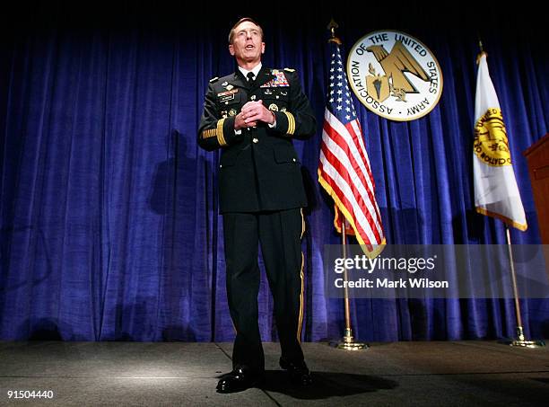 Army Gen. David Petraeus speaks during the Convention and Exposition of the Association of the United States Army at the Convention Center October 6,...