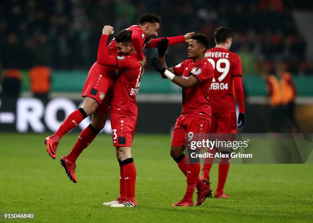 Karim Bellarabi of Leverkusen celebrate with his team mates after he scores the 3rd goal during extzra time during the DFB Cup quarter final match...