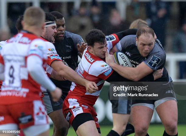 Matt Scott of Gloucester Rugby tackles Kyle Cooper of Newcastle Falcons during the Anglo-Welsh Cup match between Newcastle Falcons and Gloucester...