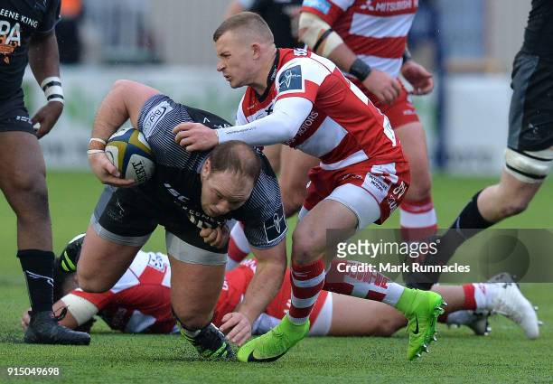 Ben Vellacott of Gloucester Rugby tackles Kyle Cooper of Newcastle Falcons during the Anglo-Welsh Cup match between Newcastle Falcons and Gloucester...