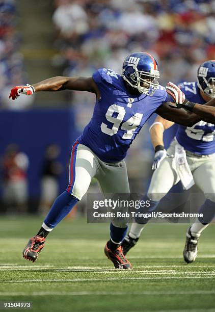 Mathias Kiwanuka of the New York Giants defends against the Washington Redskins during their game on September 13, 2009 at Giants Stadium in East...