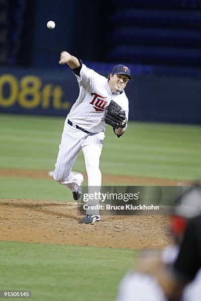 Joe Nathan of the Minnesota Twins pitches to the Kansas City Royals and get his 46th save of the season, a new Twins record on October 2, 2009 at the...