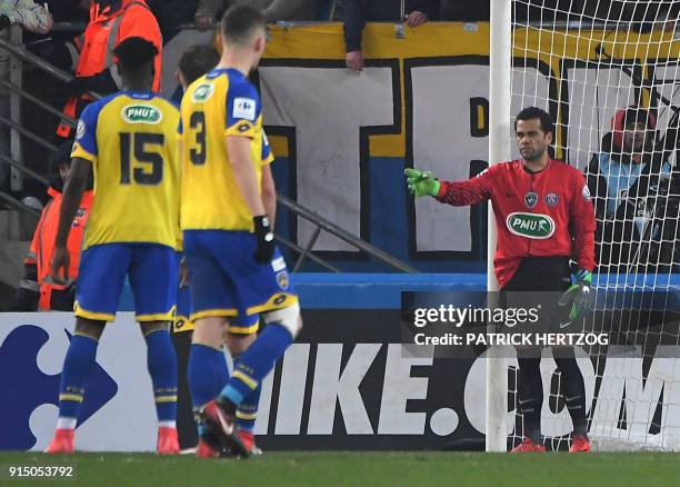 Paris Saint-Germain's Brazilian defender Daniel Alves plays as goalkeeper after Paris Saint-Germain's German goalkeeper Kevin Trapp received a red...