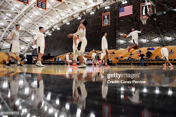 Elijah Barnes of the Princeton Tigers windmill dunks before the game against the Pennsylvania Quakers at L. Stockwell Jadwin Gymnasium on February 6,...