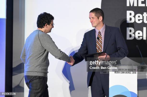 David Remnick accepts award from Jon Dorn at the American Magazine Media Conference 2018 on February 6, 2018 in New York City.