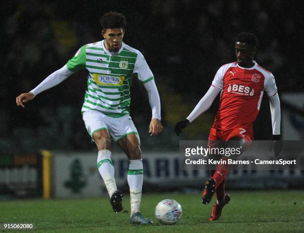 Yeovil Town's Omar Sowunmi under pressure from Fleetwood Town's Jordy Hiwula during the Checkatrade Trophy Quarter-Final match between Yeovil Town...
