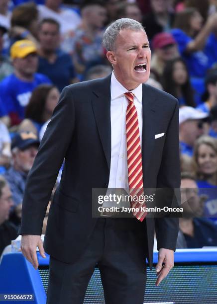 Head coach Andy Enfield of the USC Trojans yells from the bench during the game against the UCLA Bruins at Pauley Pavilion on February 3, 2018 in Los...