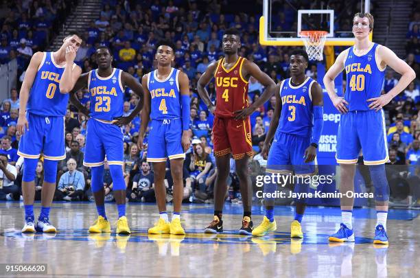 Alex Olesinski, Prince Ali, Bruins, Jaylen Hands of the UCLA Bruins, Chimezie Metu of the USC Trojans and Aaron Holiday and Thomas Welsh of the UCLA...