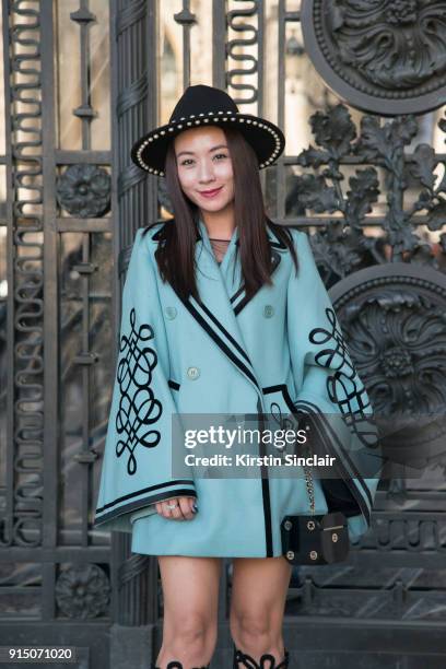 Fashion buyer Nicole Hoi wears an Elie Saab jacket and a Chanel bag day 5 of Paris Womens Fashion Week Spring/Summer 2018, on September 30, 2017 in...