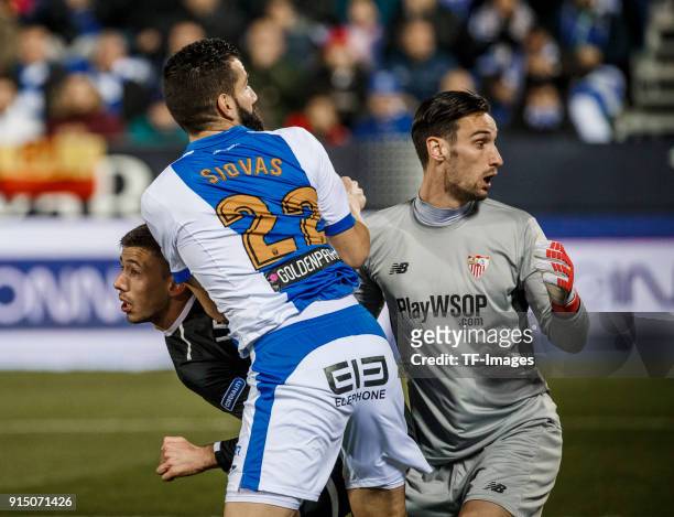 Siovas of Leganes scores the team`s first goal and Sergio Rico of Sevilla looks on during the Copa del Rey semi-final first leg match between CD...