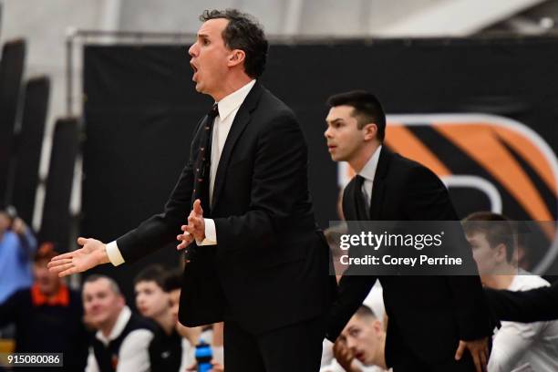 Head coach Mitch Henderson of the Princeton Tigers yells to his team against the Pennsylvania Quakers during the first half at L. Stockwell Jadwin...