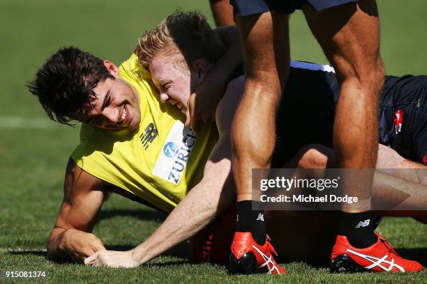 Christian Petracca gets Clayton Oliver in a playful headlock during a Melbourne Demons AFL training session at Gosch's Paddock on February 7, 2018 in...