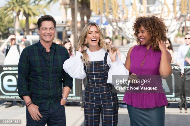 Rob Lowe, Renee Bargh and Tanika Ray visit "Extra" at Universal Studios Hollywood on February 6, 2018 in Universal City, California.